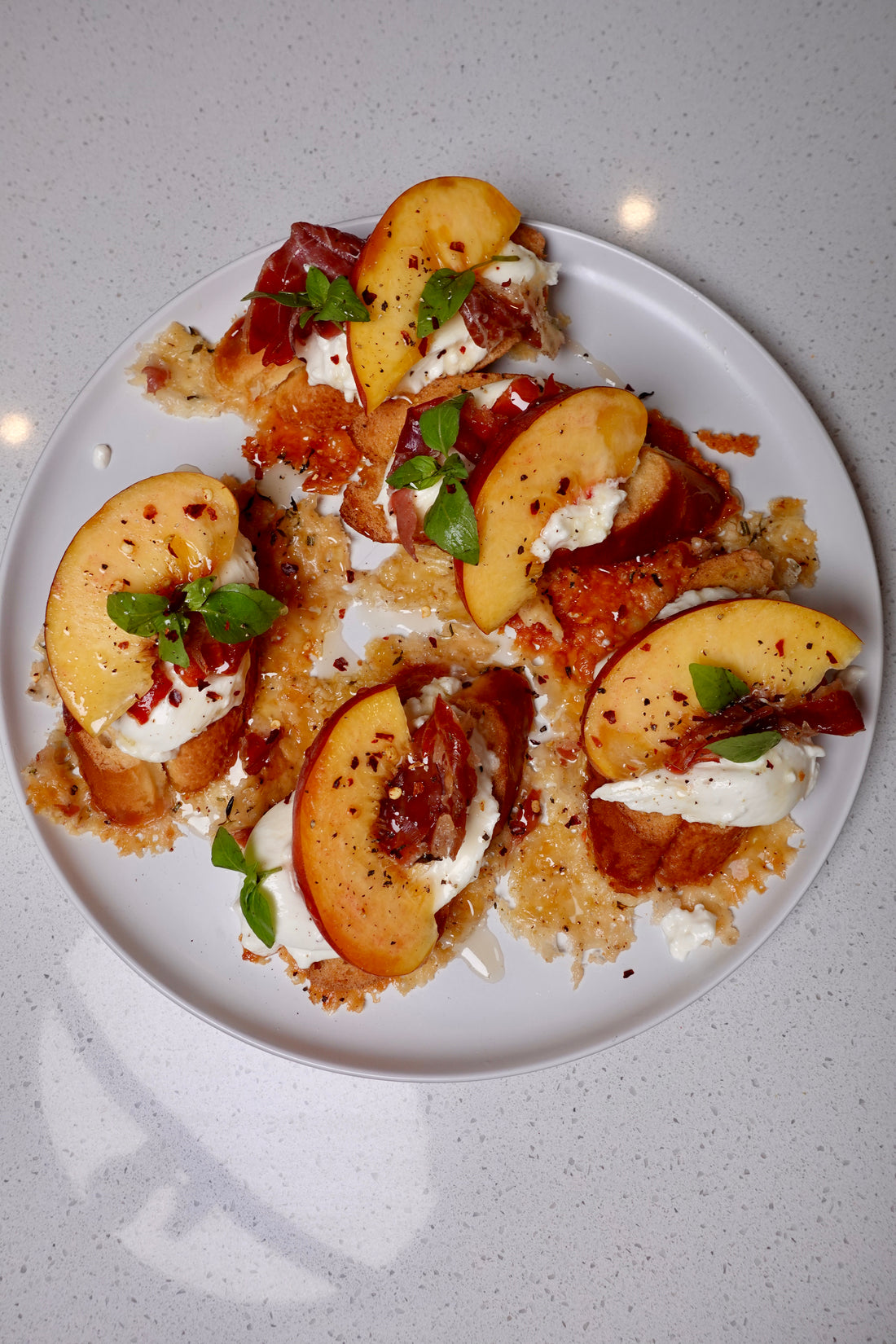 Cheesy Burrata and Prosciutto Toasts with Peaches and Hot Honey