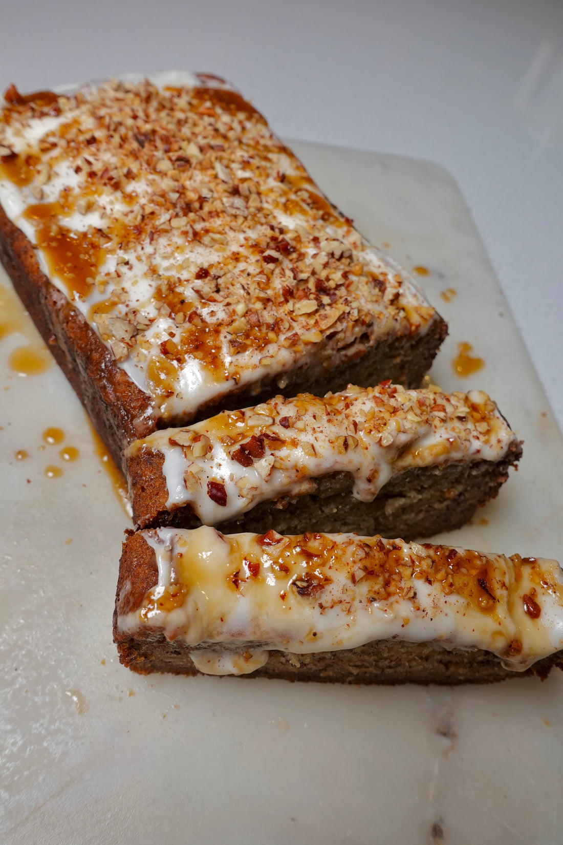 Banana Bread with Whipped Cream Cheese Frosting and Bourbon Pecan Glaze